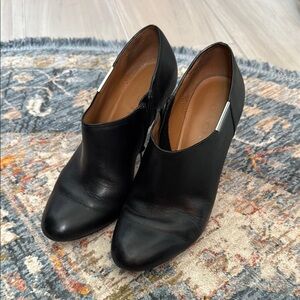 Coach Elegant Black Women's Zippered bootie with silver hardware